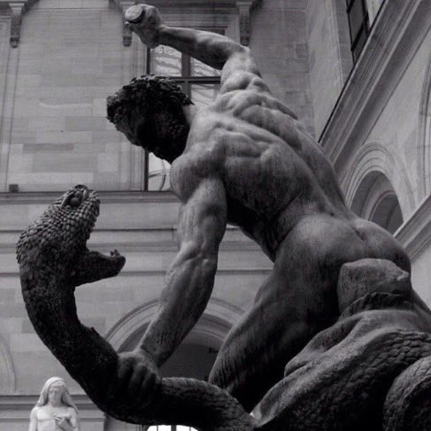 Classical statue of an athletic fighter in a powerful stance